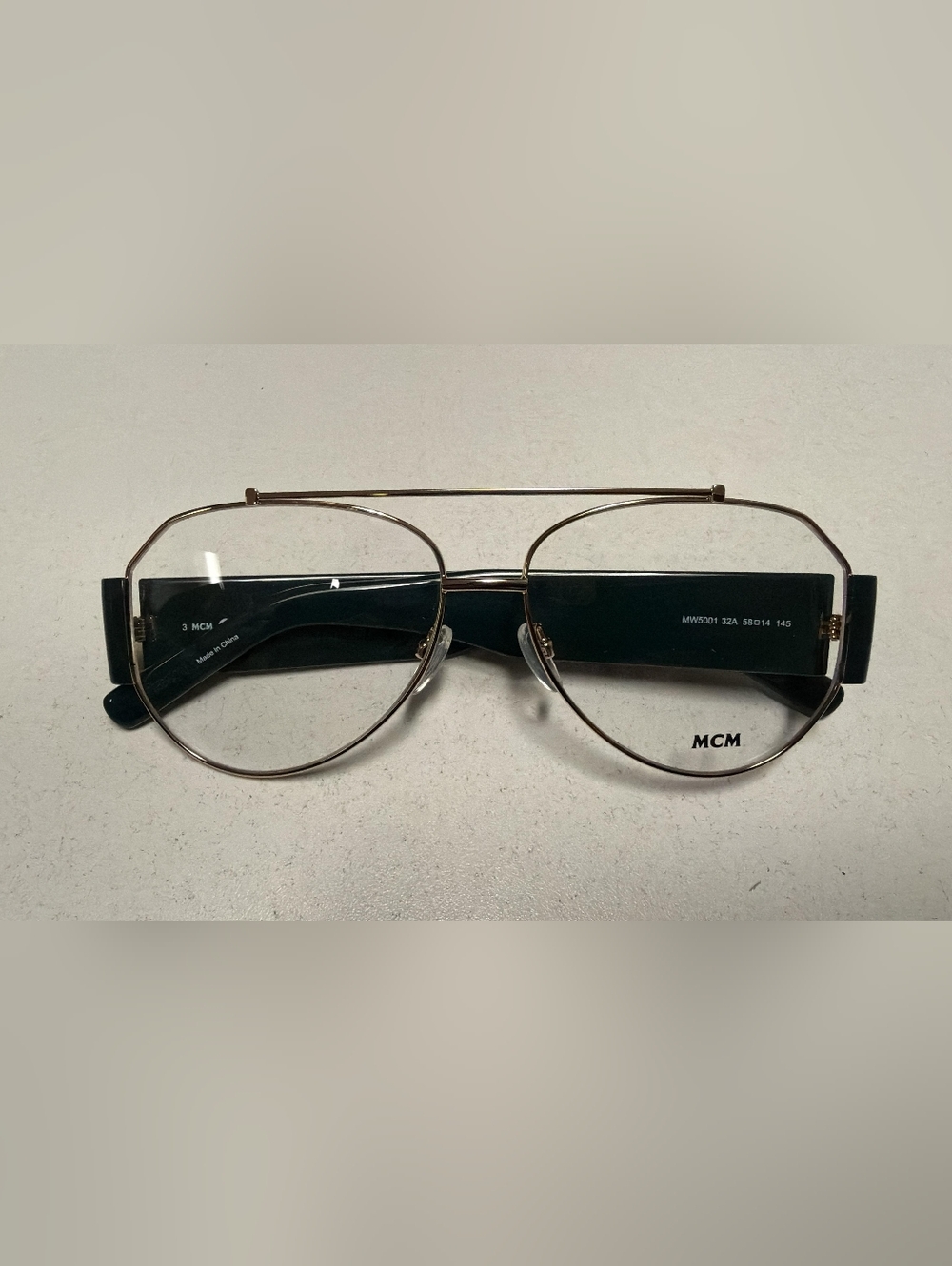 MCM MW5001, Men's Eyewear Frame  with Black and Gold Frame, Size58X14X145 - Picture 5 of 10